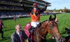 HRACING-FRA-ARC DE TRIOMPHE-QATAR<br>Italian jockey Cristian Demuro riding Favourite Ace Impact celebrates after winning the Qatar Prix de l'Arc de Triomphe horse race at the Paris Longchamp racecourse in Paris, on October 1, 2023. (Photo by Dimitar DILKOFF / AFP) (Photo by DIMITAR DILKOFF/AFP via Getty Images)