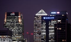 Office blocks of Citi, Barclays, and HSBC banks at dusk in the Canary Wharf financial district in London,