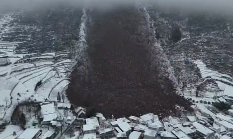 Dozens buried under rubble after landslide in south-west China – video