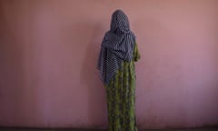 A Tigrayan woman who says she was gang raped by Amhara fighters, stands for a portrait in eastern Sudan, near the border with Ethiopia, on March 23, 2021. "Let the Tigray government come and help you," she recalled them saying, even while they were raping her. (AP Photo/Nariman El-Mofty) rape