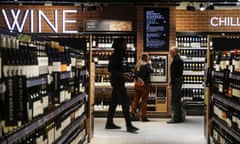 On ‘cracking form’ for wine: Marks & Spencer. A customer, centre, tastes a sample of wine in the wine and spirits section of the newly refurbished Marks & Spencer Group food shop in London, UK.