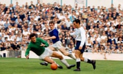 Tottenham Hotspurs’ Jimmy Greaves rounds Birmingham City goalkeeper Colin Withers at White Hart Lane in September 1964.