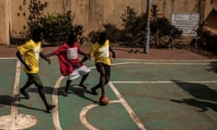 Patients play football, which was introduced as part of an effort to add therapeutic options, at the Sierra Leone Psychiatric Hospital in Freetown, Sierra Leone.