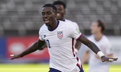 Tim Weah celebrates scoring his side's opening goal against Jamaica