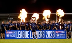 Wigan players celebrate winning the League Leaders' Shield