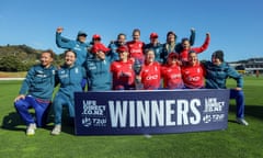 The England team celebrate winning the series.