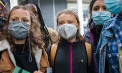 Greta Thunberg, centre, joins protesters outside Standard Chartered in the City of London on Friday