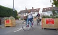 People cycling on a closed road