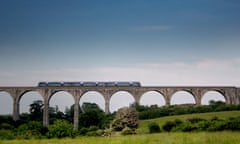 Craigmore Viaduct, Co Armagh, Northern Ireland<br>Evening Translink crosses Craigmore Viaduct.