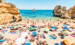 Bathers on Camilo Beach, Lagos, on the Algarve, Portugal.