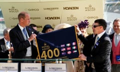 Aidan O'Brien with the Prince of Wales after being presented with a saddle cloth representing his 400th Group One winner.