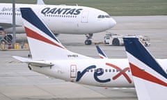 Qantas and Rex planes on the apron at an airport