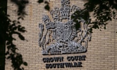 Sign for Southwark crown court on a brick wall