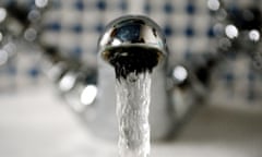 Close-up of a tap releasing drinking water