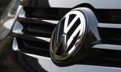 Volkswagen badge on the front of a VW Golf car