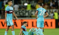 West Ham’s players look dejected at the final whistle.