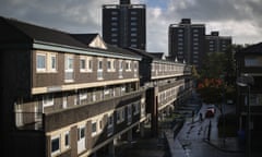 Children play in front of their homes on the Falinge Estate