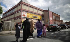 Parents and children outside Oldknow academy