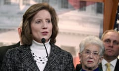 FILE - March 25, 2014, then, U.S. Rep. Vicky Hartzler, R-Mo., left, speaks to reporters on Capitol Hill in Washington on March 25, 2014. Senate candidate Vicky Hartzler’s campaign says she has no plans to delete a tweet in which she wrote, “Women’s sports are for women, not men pretending to be women,” even after Twitter said she won’t be able to tweet, retweet, follow or like posts until she does. Twitter on Monday, Feb. 28, 2022, suspended Hartzler’s personal account, (AP Photo/Lauren Victoria Burke, File)