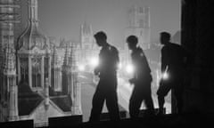 A John Bulmer photograph of students night-climbing on the roof of one of Cambridge University’s historic buildings, circa June 1959.