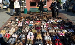 Rayleigh, Essex. 25 Nov 2011. 170 pairs or shoes laid out to represent the number of women, children and men killed due to domestic violence in UK every year, to mark UN International Day For the Elimination of Violence Against Women. Organised by the Roc<br>C9DWP4 Rayleigh, Essex. 25 Nov 2011. 170 pairs or shoes laid out to represent the number of women, children and men killed due to domestic violence in UK every year, to mark UN International Day For the Elimination of Violence Against Women. Organised by the Rochford and Castle Point Domestic Abuse Panel.