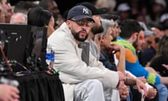 Bad Bunny looks on during a March game between the New York Knicks and the Oklahoma City Thunder at Madison Square Garden.