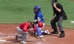 Los Angeles Angels' Taylor Ward reacts after being hit by a pitch from the Toronto Blue Jays' Alek Manoah