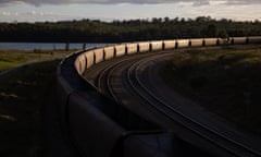 A coal train rolls past Liddell Power Station in Musswellbrook, NSW