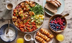 Rachel Ama’s vegan brunch of mixed berry crossover tarts (bottom), and a big sharing plate of akee ‘scramble’, baked butter beans, paprika and red peppers, and crispy crushed potatoes topped with fresh parsley and garlic lemon aïoli.