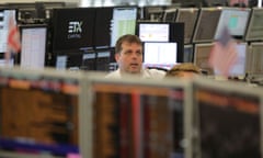 Traders from ETX Capital work in central London