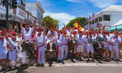 Participants in Key West’s annual lookalike context take part in a spoof ‘running of the bulls’ event