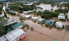 *** BESTPIX *** Lismore Residents Evacuate As Major Flood Warnings Issued Across NSW Northern Rivers<br>LISMORE, AUSTRALIA - MARCH 31: An aerial drone view of houses surrounded by floodwater on March 31, 2022 in Lismore, Australia. Evacuation orders have been issued for towns across the NSW Northern Rivers region, with flash flooding expected as heavy rainfall continues. It is the second major flood event for the region this month. (Photo by Dan Peled/Getty Images) *** BESTPIX ***