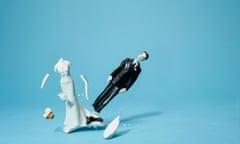 Bride and groom cake topper smashing apart