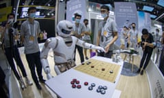 2021 World Artificial Intelligence Conference Kicks Off In Shanghai<br>SHANGHAI, CHINA - JULY 07: (EDITORS NOTE: This image was shot with a fisheye lens.) An UBTech Robotics Inc. Walker robot plays Chinese chess during 2021 World Artificial Intelligence Conference (WAIC) at Shanghai World Expo Exhibition Hall on July 7, 2021 in Shanghai, China. (Photo by VCG/VCG via Getty Images)