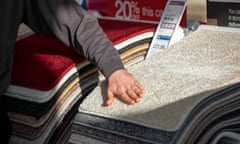 Inside A CarpetRight Plc Store As Retailer Leads U.K. Stock Gains<br>A sales representative arranges a display of carpet samples at a Carpetright Plc store in Guildford, U.K., on Monday, Feb. 13, 2017. Carpetright Plc shares were up 43 percent in the first 34 days of 2017, putting them just above Kaz Minerals Plc and Gulf Marine Services Plc at the top of the FTSE All-Share Index rankings. Photographer: Jason Alden/Bloomberg via Getty Images