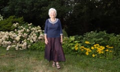 Rosemary Grant in front of flower beds in bloom in the grounds of Guyot Hall, Princeton University, New Jersey.