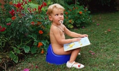 young child in garden potty training