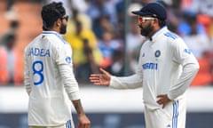 India's captain Rohit Sharma (right) and Ravindra Jadeja speak during the third day of the first Test against England