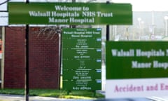 Signs outside the Walsall Manor Hospital, part of the Walsall Hospitals NHS Trust, in the West Midlands.