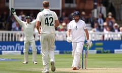 Alex Carey of Australia knocks off the bails to dismiss Jonny Bairstow.