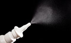 Close-up of nasal drug spraying on black background<br>HPNC40 Close-up of nasal drug spraying on black background nasal spray