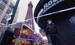 Police and firefighters beneath Blackpool Tower