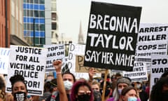 Protesters march against racial injustice following the grand jury decision in Breonna Taylor’s case.