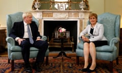 Boris Johnson poses for a photograph with Nicola Sturgeon at Bute House in Edinburgh on 29 July 29