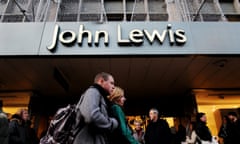 Shoppers pass a John Lewis store