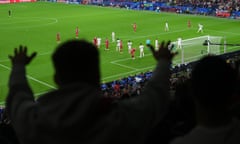 A Serbia fan reacts during his team’s 1-0 defeat to England in Gelsenkirchen on Sunday