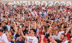 England fans celebrate at a fan zone in Trafalgar Square, central London
