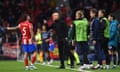 Manchester City’s manager Pep Guardiola exchanges thoughts with Rodrigo de Paul of Atlético de Madrid on Wednesday.