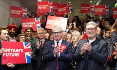 Keir Starmer (right) celebrates with the newly elected mayor of West Midlands, Richard Parker, in Birmingham.