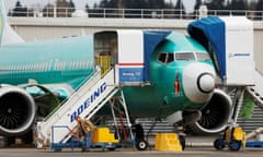 An employee works near a 737 Max aircraft at Boeing’s 737 Max production facility in Renton, Washington, US